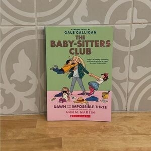 Scholastic Graphic Novel with Pink and Green Cover